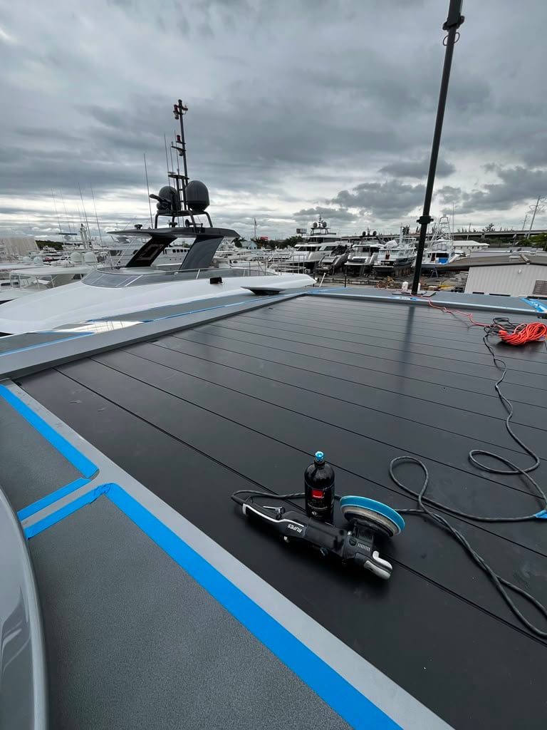 Rupes polisher on a yacht's non-skid deck