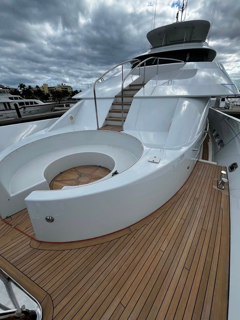 Polished yacht swim platform and teak deck